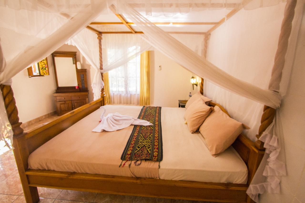 Hôtel Pondok Wisata Elsa 2 à Lovina Beach Extérieur photo